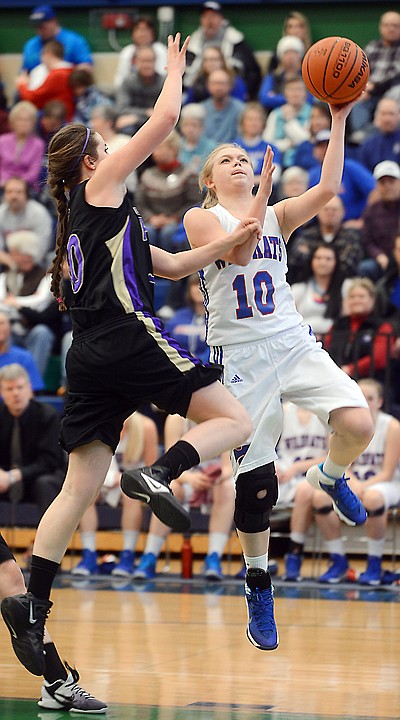 <p>Columbia Falls junior Ciera Finberg (10) shoots for two during the game against Polson on Saturday, March 1, at the Northwestern A Divisional Tournament in Kalispell. (Brenda Ahearn/Daily Inter Lake)</p>