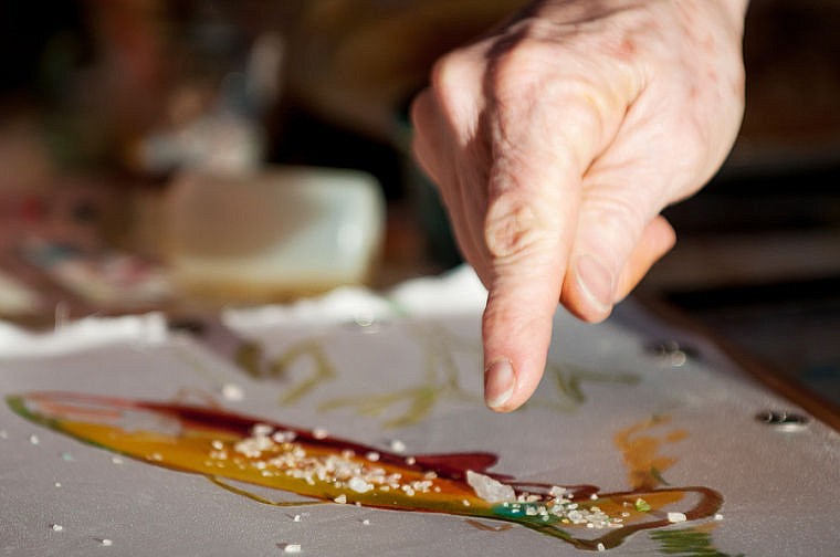 &lt;p&gt;Nancy Cawdrey sprinkles rock salt onto a painting Wednesday afternoon at her studio near Creston. The salt reacts with the paints to create unique textures. Feb. 19, 2014 in Creston, Montana. (Patrick Cote/Daily Inter Lake)&lt;/p&gt;