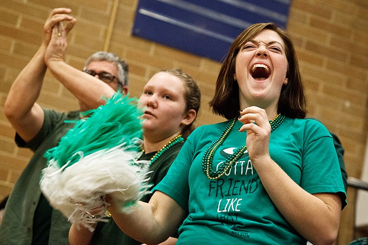 SHAWN GUST/Press

St. Maries High School alum Megan Krebs cheers for the Lumberjacks during the State 3A boys basketball tournament in Meridian.