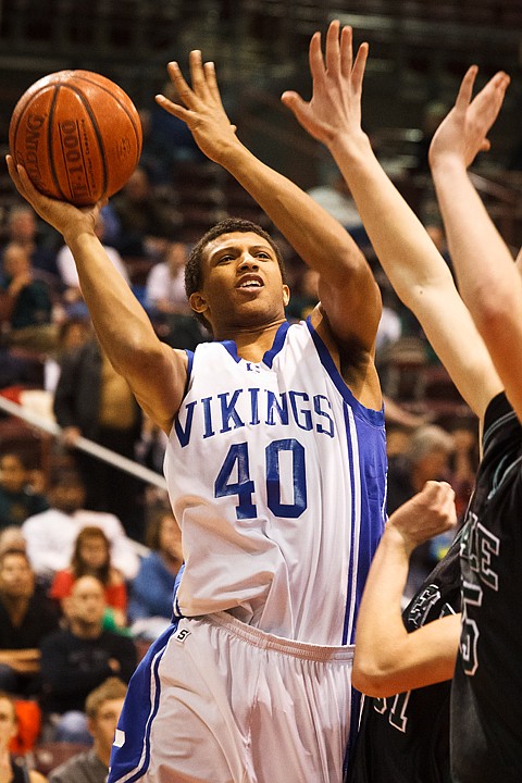 SHAWN GUST/Press

Deon Watson takes a shot in the second quarter at the Idaho Center in Nampa.