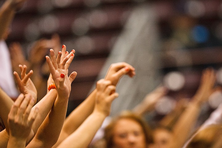 SHAWN GUST/Press

Fan offer good luck in the form of &quot;spirit fingers&quot; from the student section Thursday during a Post Falls free throw.