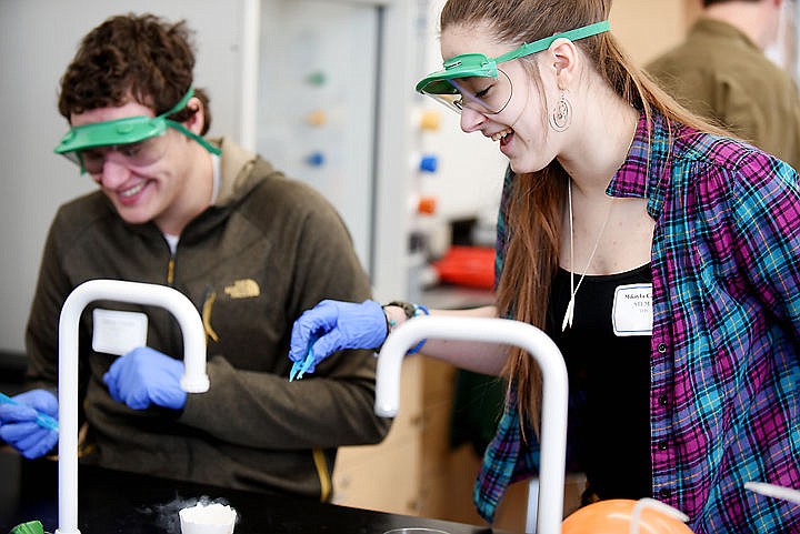 &lt;p&gt;&lt;strong&gt;Mikayla Cardin&lt;/strong&gt; and Clayton Clostio, juniors at Flathead High School, smile Tuesday as they do a chemistry project using liquid nitrogen at the seventh annual College for a Day event at Flathead Valley Community College. Approximately 800 high school juniors from around the Flathead Valley took part in the program.&#160;&lt;/p&gt;
