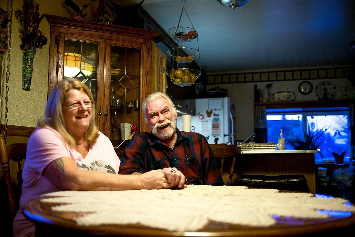 &lt;p&gt;Bill Davis and his wife of three years, Lexey, laugh on Wednesday in their mobile home in River City Village in Post Falls as they share stories of their past. The couple have lived in the Village for two years in a mobile home that was gifted to them by another veteran. Last December, the Davis' received a 90-day eviction notice, and still have yet to be informed why.&lt;/p&gt;