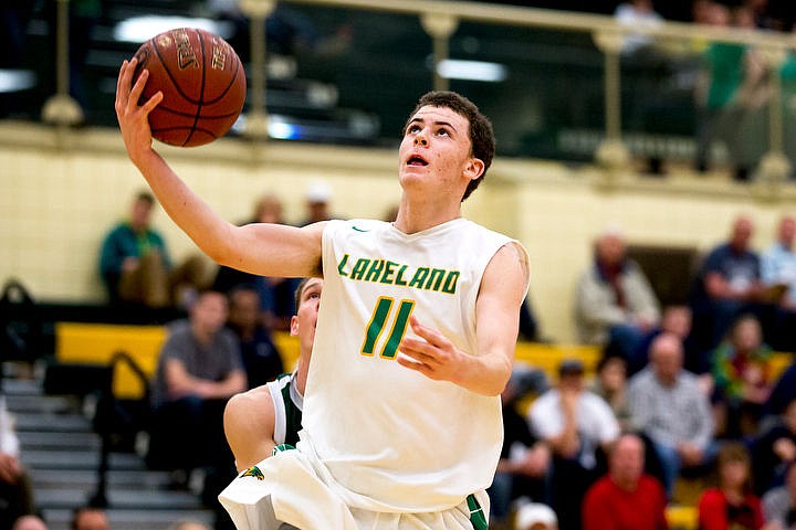 &lt;p&gt;Lakeland guard Dylan Knight soars towards the basket during a match-up against Burley at the first 4A state basketball state game on Thursday, March 3, 2016 at Borah High School in Boise. Burley defeated Lakeland 56-45.&lt;/p&gt;