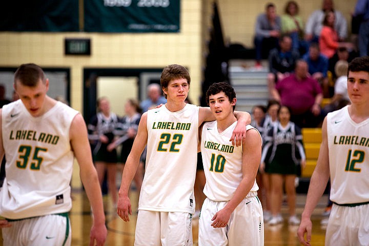 &lt;p&gt;Lakeland forward Dan McDevitt (22) puts his arm around Jared McDaniel as they walk off the court following their loss to Burley at the first 4A state basketball state game on Thursday, March 3, 2016 at Borah High School in Boise. Burley defeated Lakeland 56-45.&lt;/p&gt;