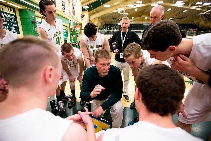 &lt;p&gt;Lakeland head coach Dave Stockwell consults with his team during a timeout at the first 4A state basketball state game on Thursday, March 3, 2016 at Borah High School in Boise. Burley defeated Lakeland 56-45.&lt;/p&gt;