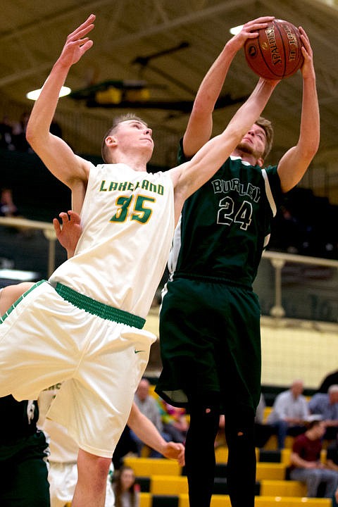 &lt;p&gt;Lakeland forward Andrew Knight (35) gets a hand on a rebound as Burley point guard Coty Hackett brings it down at the first 4A state basketball state game on Thursday, March 3, 2016 at Borah High School in Boise. Burley defeated Lakeland 56-45.&lt;/p&gt;