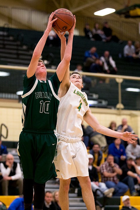 &lt;p&gt;Lakeland guard Dylan Knight battles for a rebound with Burley guard Ryan Bagley at the first 4A state basketball state game on Thursday, March 3, 2016 at Borah High School in Boise. Burley defeated Lakeland 56-45.&lt;/p&gt;