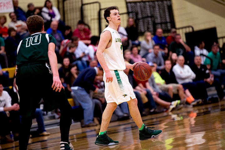 &lt;p&gt;Lakeland guard Dylan Knight looks for an open teammate as he's defended by Burley guard Ryan Bagley at the first 4A state basketball state game on Thursday, March 3, 2016 at Borah High School in Boise. Burley defeated Lakeland 56-45.&lt;/p&gt;