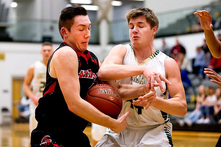 &lt;p&gt;Soda Springs guard Josh Balls, right, battles for possession of the ball with St. Maries post Nate Masterson on Thursday, March 3, 2016 in the first 2A state game at Capital High School in Boise, Idaho. The Lumberjacks defeated the Cardinals 45-42.&lt;/p&gt;