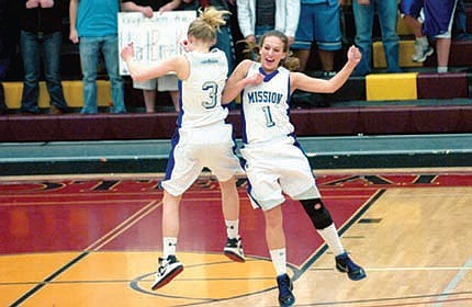 &lt;p&gt;Loren Erickson and Ashley Courville bump during pregame
introductions before playing Loyola Sacred Heart last year.&lt;/p&gt;