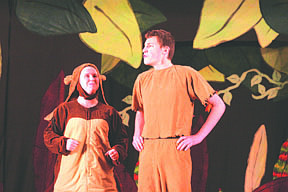 Katie Murk, from the Missoula Childrens Theatre, as Baloo talks with Mowgli, played by St. Regis student Dallas Yearout.