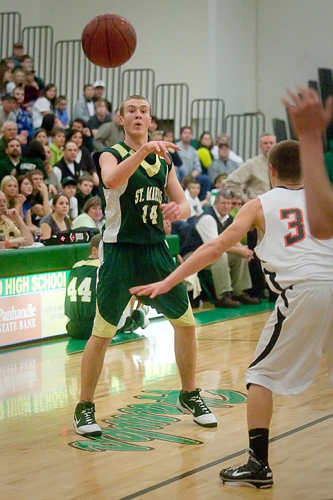 &lt;p&gt;St. Maries High School's Zach Lehman passes the ball to a teammate during the game against Priest River Lamanna High School at the Boys Intermountain League 3A District Tournament Feb. 26 at Lakeland High School in Rathdrum.&lt;/p&gt;