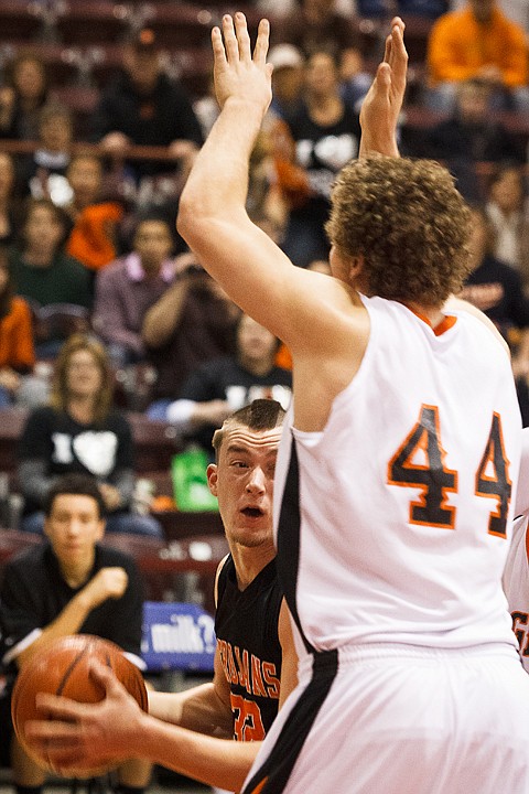 SHAWN GUST/Press

Matt Lickfold looks for a pass option against an Idaho Falls defender.