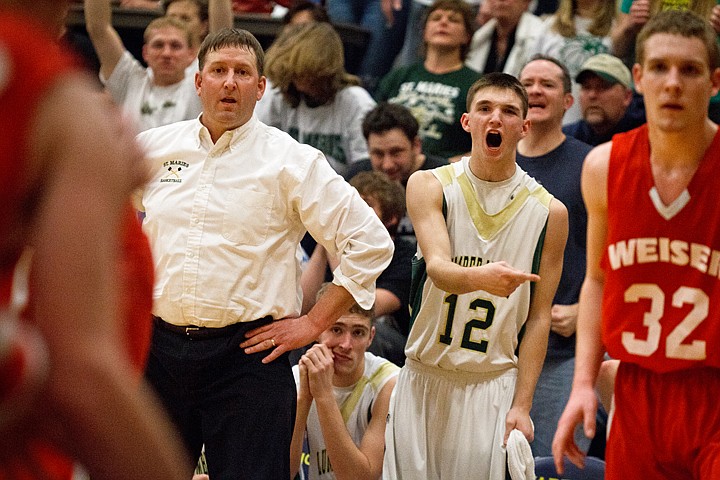 SHAWN GUST/Press

The Lumberjacks' Cole Sampson shouts from the bench during the second half against Weiser High School.