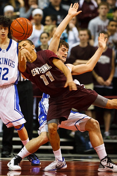 SHAWN GUST/Press

Coeur d'Alene's Chad Chalich blocks Centennial High School's Patrick Manning while making a pass in the second half.