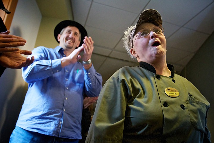 &lt;p&gt;Nancy &quot;Grandma&quot; Carter is applauded by Art Wirz, director of hospitality at the Coeur d'Alene Casino, as she reacts to seeing her name on the sign for the employee cafeteria during a party held for her Thursday.&lt;/p&gt;