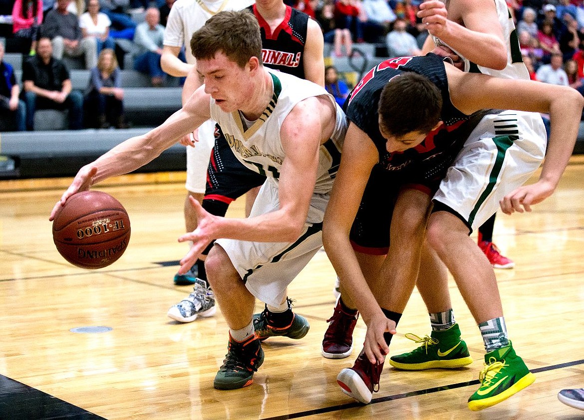 &lt;p&gt;JAKE PARRISH/Press St. Maries guard Jake Sieler scrambles with Soda Springs center Riley Harris on Thursday, March 3, 2016 in the first 2A state game at Capital High School in Boise, Idaho.&lt;/p&gt;