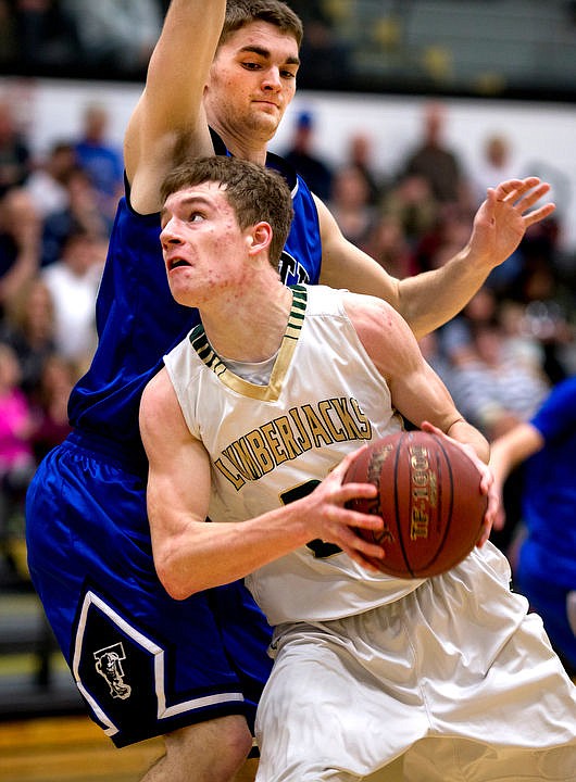 &lt;p&gt;St. Maries post Kiefer Gibson drives to the basket as Firth point guard Connor Burkhart defends at the 2A state semifinal game on Friday at Capital High School in Boise. St. Maries fell to Firth 58-26. PURCHASE PHOTO: www.cdapress.com/photos&lt;/p&gt;