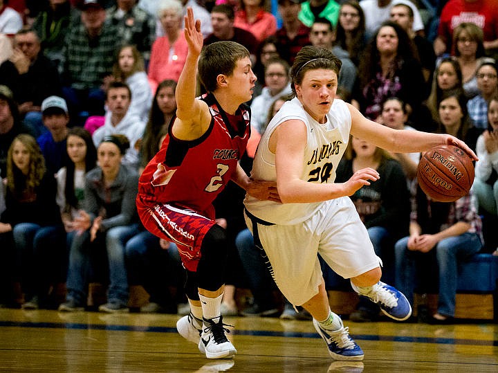 &lt;p&gt;Genesis Prep guard Jonny Hillman drives to the basket as Council guard Lance Nichols defends at the 1A Division II semifinal game on Friday, March 4, 2016 at Caldwell High School in Caldwell, Idaho. Genesis Prep fell to Council, 48-39, ending their chance at the state title. PURCHASE PHOTO: www.cdapress.com/photos&lt;/p&gt;