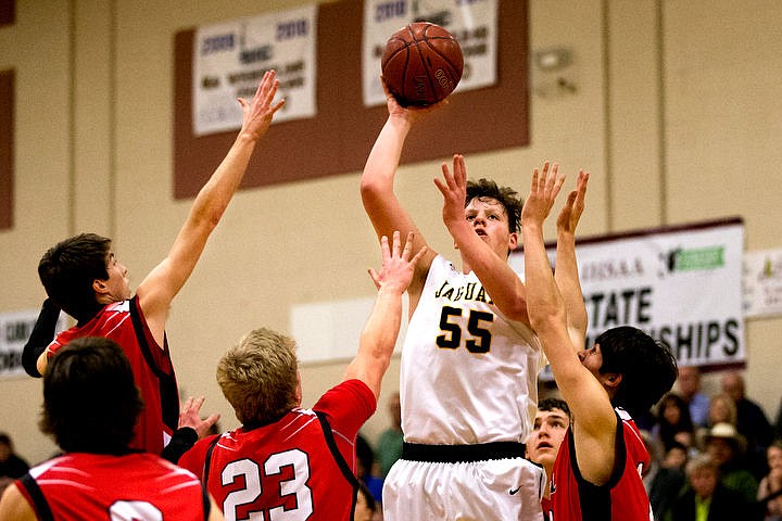 &lt;p&gt;Genesis Prep forward Caleb Symons shoots past multiple Council defenders at the 1A Division II semifinal game on Friday, March 4, 2016 at Caldwell High School in Caldwell, Idaho. Genesis Prep fell to Council, 48-39, ending their chance at the state title. PURCHASE PHOTO: www.cdapress.com/photos&lt;/p&gt;