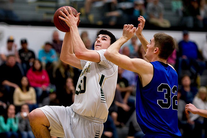 &lt;p&gt;St. Maries post Brady Martin drives to the basket as Firth point guard Connor Burkhart defends at the 2A state semifinal game on Friday at Capital High School in Boise. St. Maries fell to Firth 58-26. PURCHASE PHOTO: www.cdapress.com/photos&lt;/p&gt;