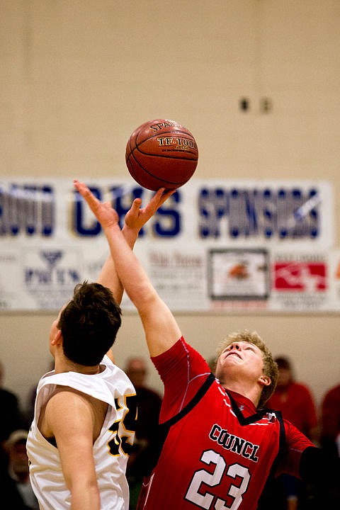 &lt;p&gt;Genesis Prep forward Caleb Symons beats Council wing JT Mahon and gets some fingers on the ball at the tip-off to start the 1A Division II semifinal game on Friday, March 4, 2016 at Caldwell High School in Caldwell, Idaho. Genesis Prep fell to Council, 48-39, ending their chance at the state title. PURCHASE PHOTO: www.cdapress.com/photos&lt;/p&gt;