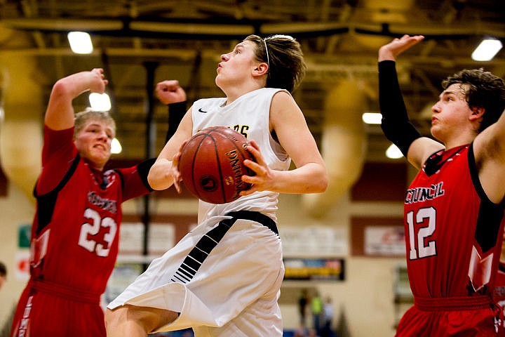 &lt;p&gt;Genesis Prep guard Jonny Hillman soars towards the basket past Council wing Jared Neal, right, and Council wing JT Mahon at the 1A Division II semifinal game on Friday, March 4, 2016 at Caldwell High School in Caldwell, Idaho. Genesis Prep fell to Council, 48-39, ending their chance at the state title. PURCHASE PHOTO: www.cdapress.com/photos&lt;/p&gt;