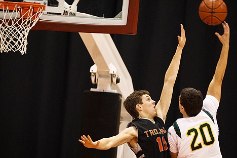 &lt;p&gt;Seth Anderson, of Post Falls, goes up in an attempt to block a shot from Borah High's Ben Tucakovic in the third quarter.&lt;/p&gt;