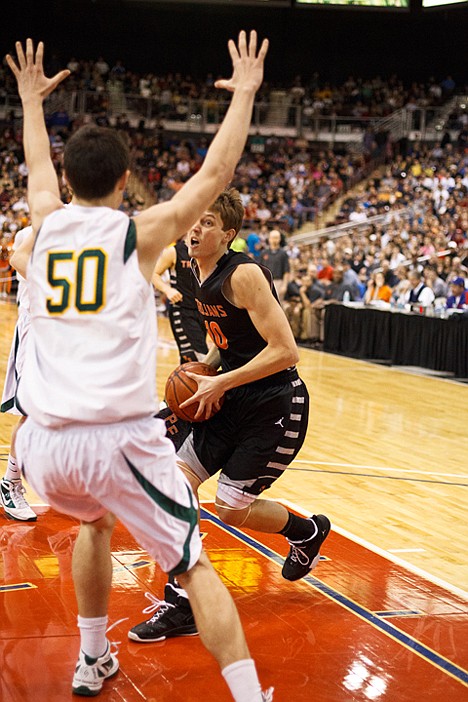 &lt;p&gt;Borah's Brock Holubetz (50) puts up tall hands in front of Post Falls' Luke Thoreson.&lt;/p&gt;