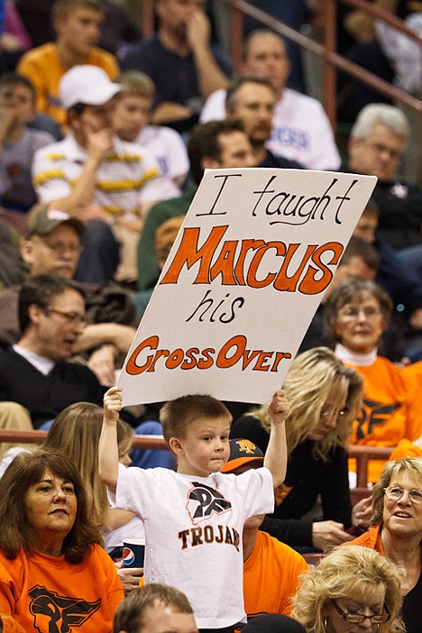 &lt;p&gt;Trenton McLean, the four-year-old son of the Post Falls head coach, waves a sign from the crowd Saturday at the Idaho Center.&lt;/p&gt;