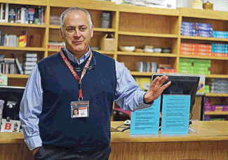 &lt;p&gt;Tom Albertson speaks with Sandpoint High School staff after being named Idaho&#146;s assistant principal of the year. (Photo by WILL LOVE)&lt;/p&gt;