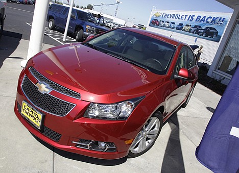 &lt;p&gt;A Chevrolet Cruze is featured at a car dealership in San Jose, Calif. President Obama said Saturday on his radio address that fuel-efficient cars are the way to offset high prices at the pump.&lt;/p&gt;