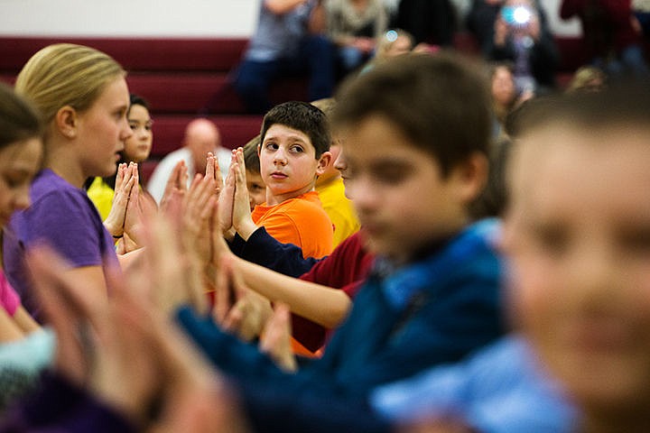 &lt;p&gt;Logan Robillard listens for instructions from the professional dancers teaching the fifth graders at Ramsey Magnet School of Science ballroom dancing on Wednesday afternoon. The dancers from the National League of Junior Cotillions and the fifth graders ended their four weeks of lessons with a performance.&lt;/p&gt;