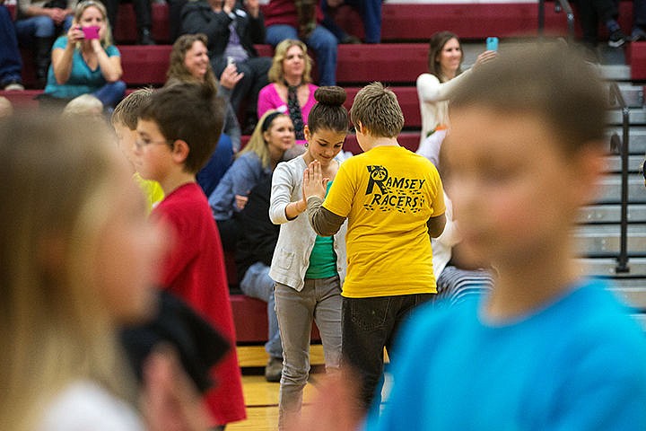 &lt;p&gt;Mia Sutherland and Caden West dance the foxtrot during a ballroom dancing performance at Ramsey Magnet School of Science on Wednesday afternoon.&lt;/p&gt;