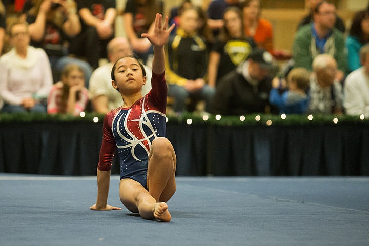 &lt;p&gt;Nica DeGuzman, 11, of Richmond Canada performs her floor routine and scores a high 9.6 on Saturday at the Great West Gymfest at the Coeur d'Alene Resort.&lt;/p&gt;