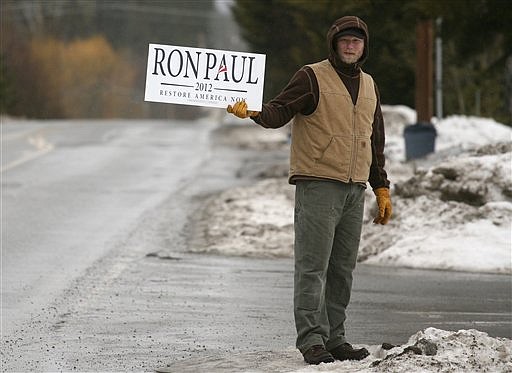 &lt;p&gt;Dominic Brauer of Sandpoint, Idaho, holds a sign outside the Bonner County Fairgrounds before a town hall meeting with Republican presidential candidate Rep. Ron Paul, R-Texas, Monday, March 5, 2012, in Sandpoint. (AP Photo/Matt Mills McKnight)&lt;/p&gt;