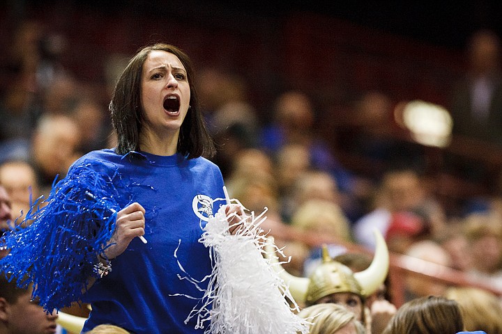 &lt;p&gt;Megan Fantozzi cheers for the Coeur d'Alene High School boys basketball team from the stands Friday during the semi-final round of the 5A state tournament in Nampa.&lt;/p&gt;