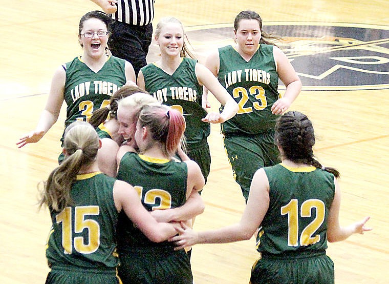 &lt;p&gt;St. Regis' girls celebrate Friday's win over Charlo. The victory clinched the Tigers a spot in the Western C divisional tournament where their season came to an end.&#160;&lt;/p&gt;