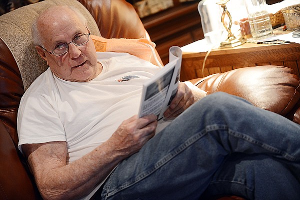 &lt;p&gt;Ron Valiquette reads excerpts from his book Dancing with Celia &#151; Survivng a Pacific Coast Hurricane on Thursday, January 31, at his home in Polson. (Brenda Ahearn/Daily Inter Lake)&lt;/p&gt;