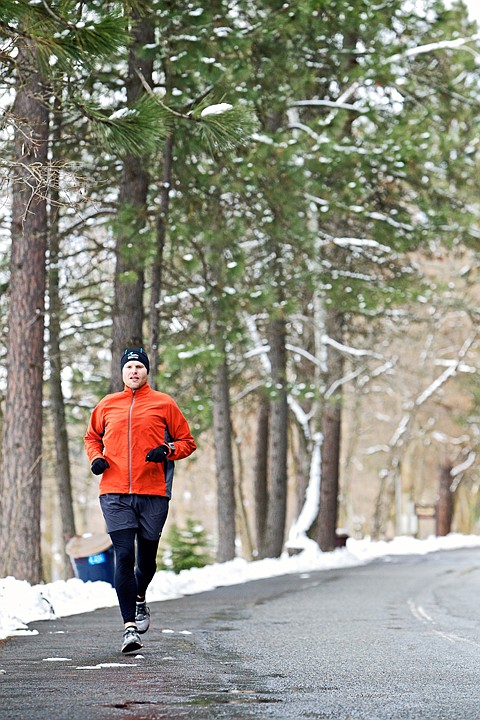 &lt;p&gt;JEROME A. POLLOS/Press Brian Pomerantz works through the halfway point of his 10-mile run Thursday as he jogs around North Idaho College on Rosenberry Drive.&lt;/p&gt;