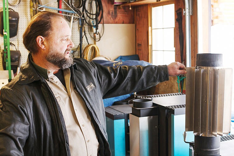 &lt;p&gt;Jim McCollam shows off the fins of The Heat Bandit, a heat reclaimer that attaches to the stove pipe and extracts heat that would normally escape up the pipe. Wednesday, Feb. 27, 2013 in Kalispell, Montana. (Patrick Cote/Daily Inter Lake)&lt;/p&gt;