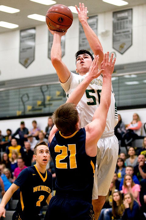 &lt;p&gt;St. Maries post Brady Martin takes a jump shot over Wendell guard Logan Bowers at the 2A state third place game on Saturday at Capital High School in Boise, Idaho. St. Maries fell to Wendell, 71-62. PURCHASE PHOTO: www.cdapress.com/photos&lt;/p&gt;
