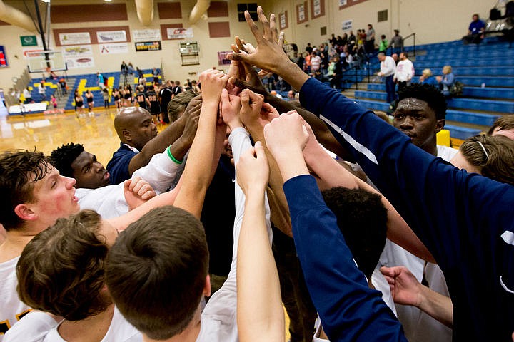 &lt;p&gt;The Genesis Prep boys basketball team celebrate after defeating Clark County at the 1A Division II state third place game on Saturday at Caldwell High School in Caldwell, Idaho. The Jaguars defeated the Bobcats 57-30. PURCHASE PHOTO: www.cdapress.com/photos&lt;/p&gt;