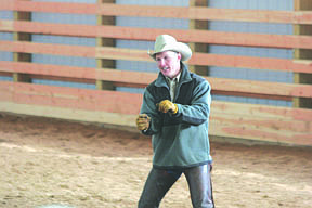 Marc Haskins talks and demonstrates during the clinic he hosted on Feb. 19. Haskins said that he hopes the clinics will give riders some information that they can use to help their horses.