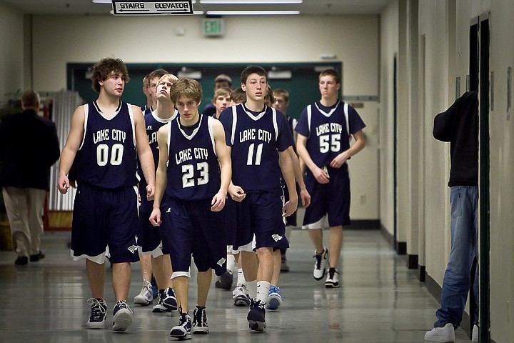 &lt;p&gt;J.J. Stoddard leads his Lake City teammates out of the tunnel at the Idaho Center and to the court for the second half of their match-up against Rocky Mountain High Friday at the state 5A boys basketball tournament at Idaho Center in Nampa. The T-Wolves were eliminated from the tournament after the 72-52 loss to the Grizzlies.&lt;/p&gt;