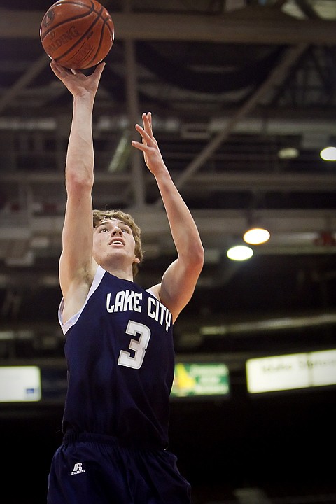 &lt;p&gt;Lake City High's Brady Smith puts up a shot during the first half of their game Friday at the state 5A boys basketball tournament at Idaho Center in Nampa. The T-Wolves were eliminated from the tournament after the 72-52 loss to the Grizzlies.&lt;/p&gt;