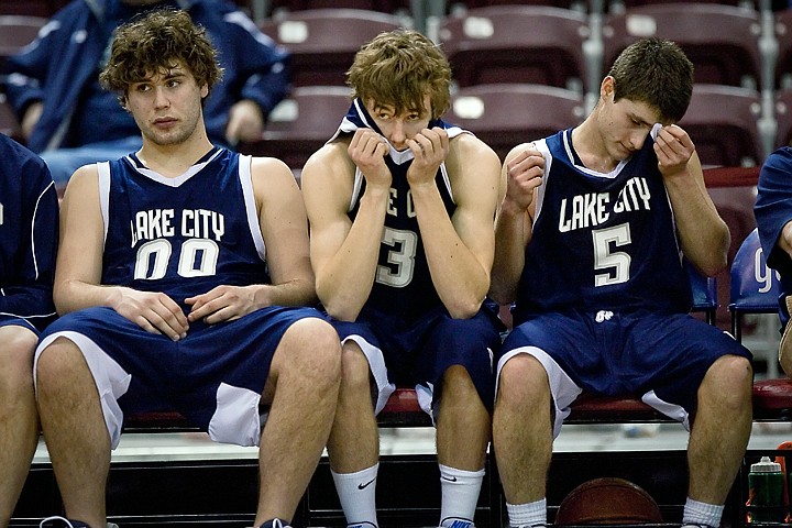 &lt;p&gt;Lake City High's Wes Beusan, left, Brady Smith and Chris Wheelock wait for the final minutes to run down of their 72-52 loss to Rocky Mountain High Friday at the state 5A boys basketball tournament at Idaho Center in Nampa.&lt;/p&gt;