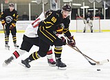 Wolverines win playoff opener with Butte