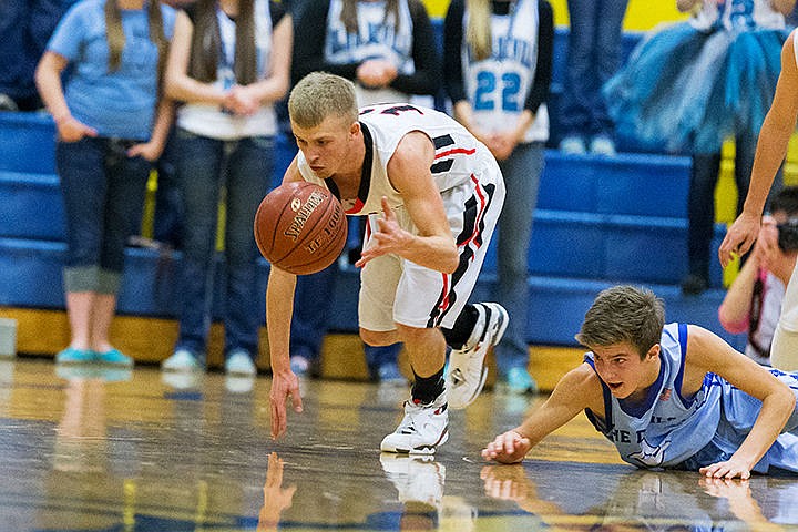 &lt;p&gt;Lakeside High School&#146;s Hunter Kolar scrambles ahead of Dietrich&#146;s Jake Smith for the ball during the state 1A Division II basketball tournament on Thursday.&lt;/p&gt;